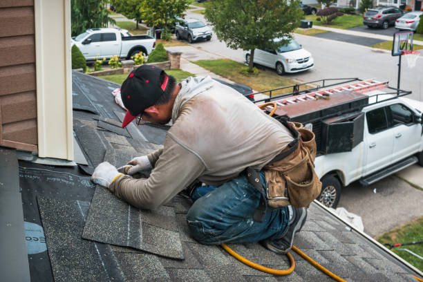 Professional Roofing technician working in Brisbane, CA